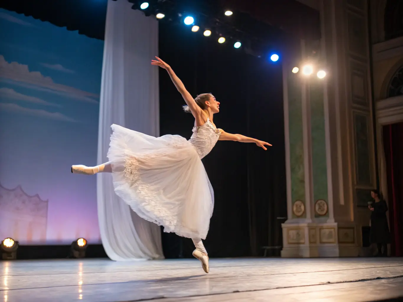 A captivating image of CYP DANCE students performing a ballet routine on stage during a recent recital, highlighting their grace and technique.